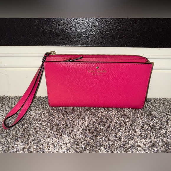 kate spade Handbags - Kate spade pink Layton wristlet wallet